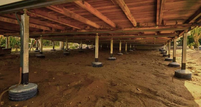 stumps placed under a house in melbourne